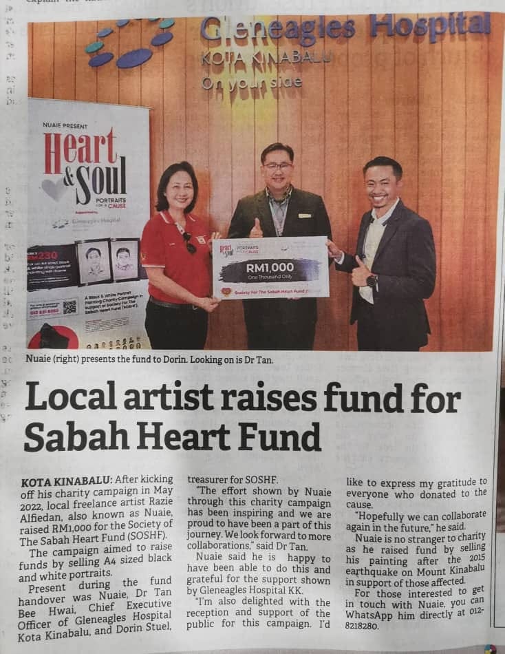 Handing over RM1,000 raised for the Sabah Heart Fund